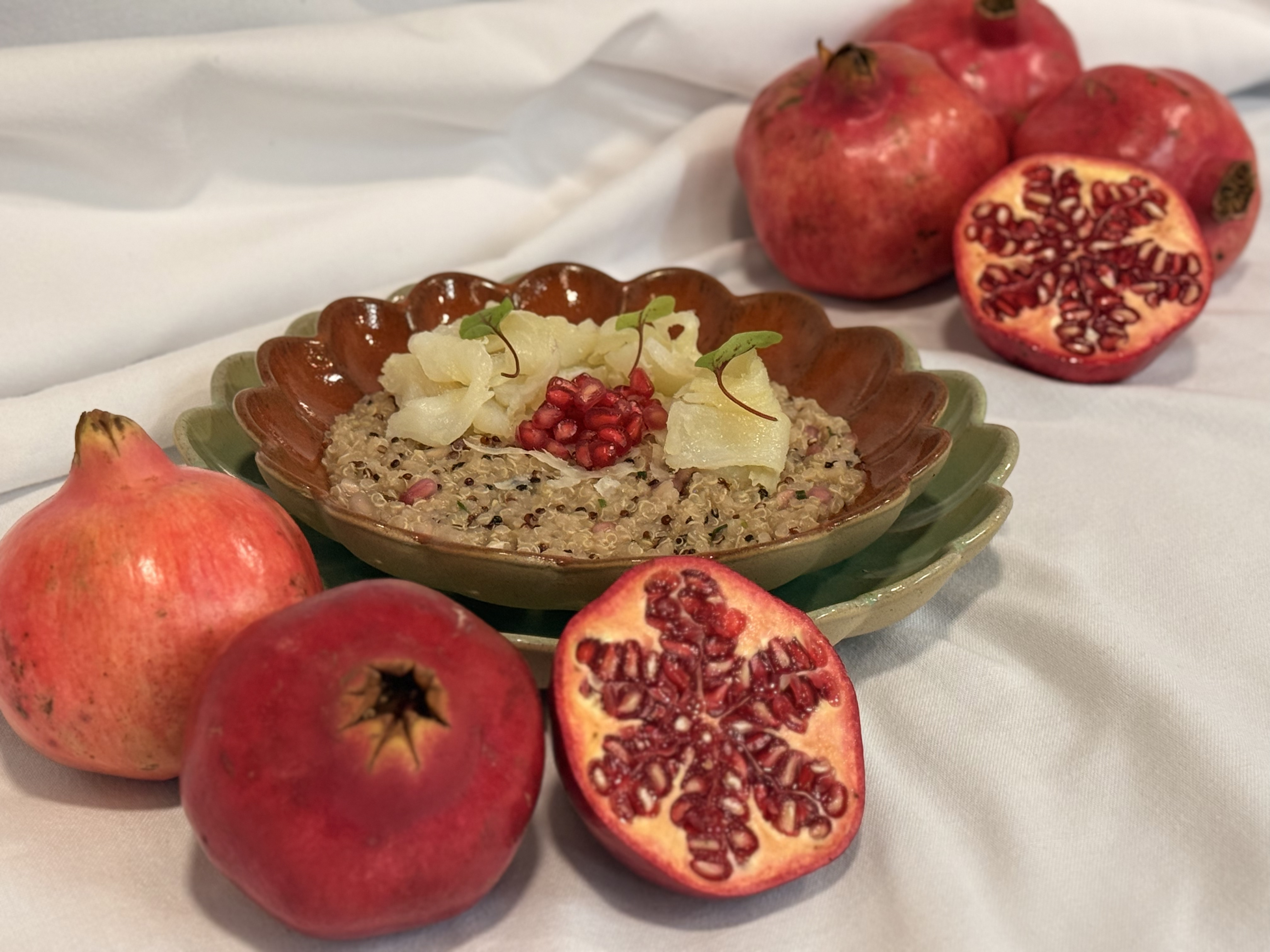 Quinotto de romã com bacalhau fumado